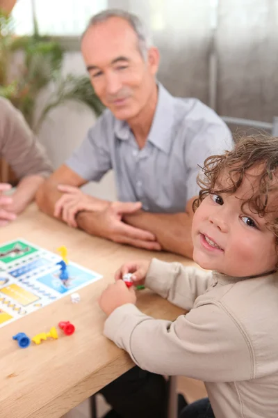 Grandfather playing with grandson — Stock Photo, Image