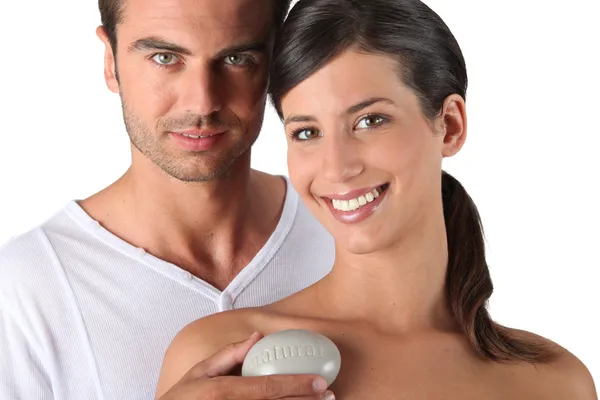 Couple holding a bar of soap — Stock Photo, Image