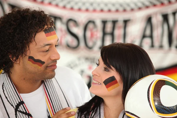 Couple of german soccer supporters — Stock Photo, Image