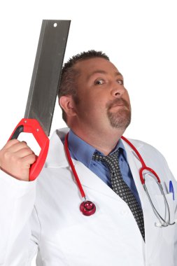 Scary surgeon holding saw clipart