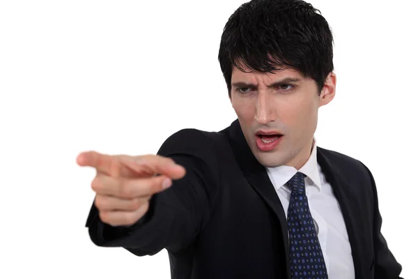 Aggressive businessman pointing — Stock Photo, Image