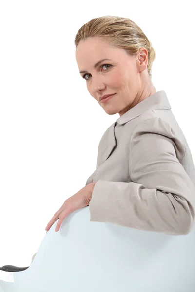 Businesswoman on chair — Stock Photo, Image