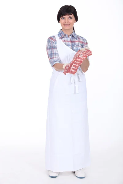 Woman butcher on white background — Stock Photo, Image