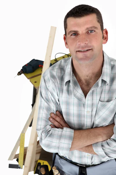 Carpenter with a workbench — Stock Photo, Image