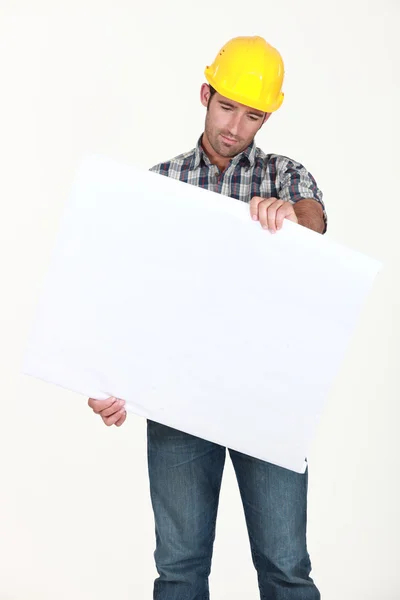Dělníci zkoumání bílá deska — Stock fotografie