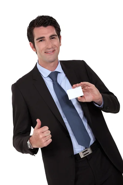Empresário mostrando cartão — Fotografia de Stock