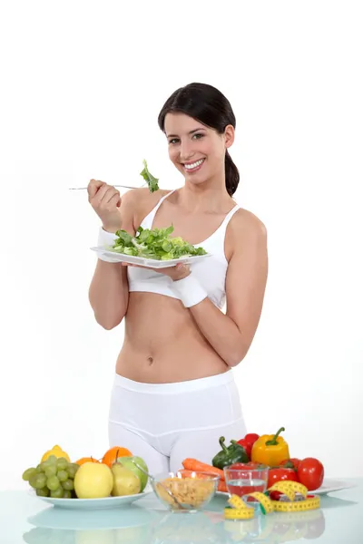 Woman eating healthy food — Stock Photo, Image