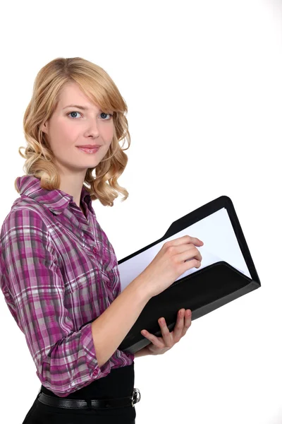 Casual female worker holding folder — Stock Photo, Image