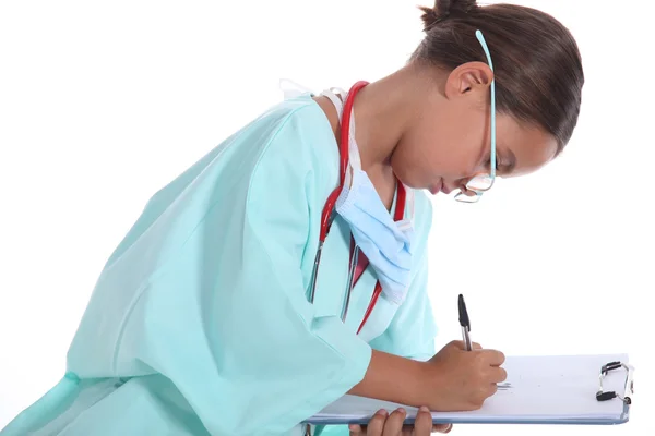 간호사 제복을 입은 작은 소녀의 초상화 — 스톡 사진