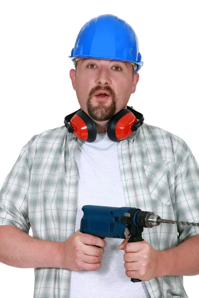 Man with beard holding power drill — Stock Photo, Image