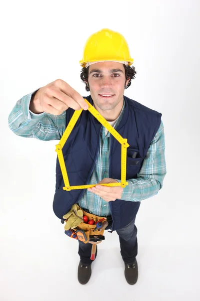Człowiek z żółtym kapeluszu twardy — Zdjęcie stockowe