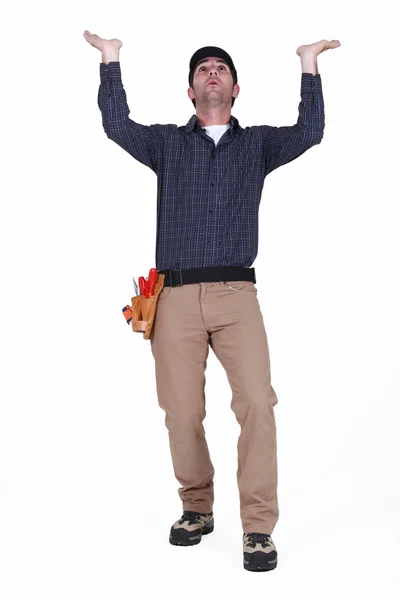 Laborer gesturing on white background — Stock Photo, Image