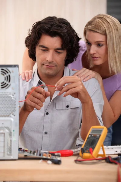 Technician repairing computer — Stock Photo, Image