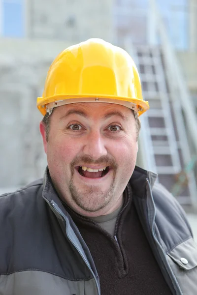 Excited chubby manual worker — Stock Photo, Image