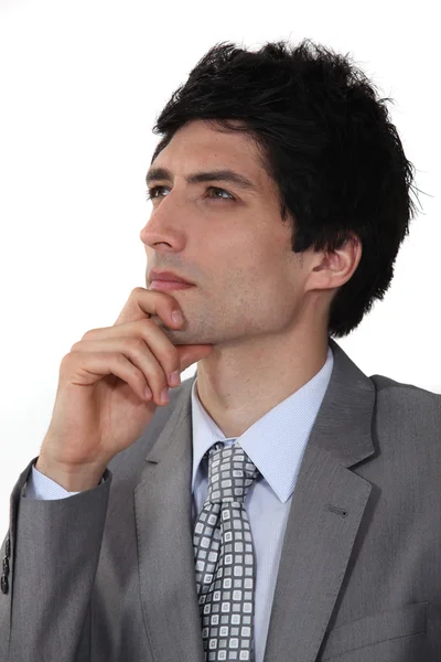 Pensive young businessman — Stock Photo, Image