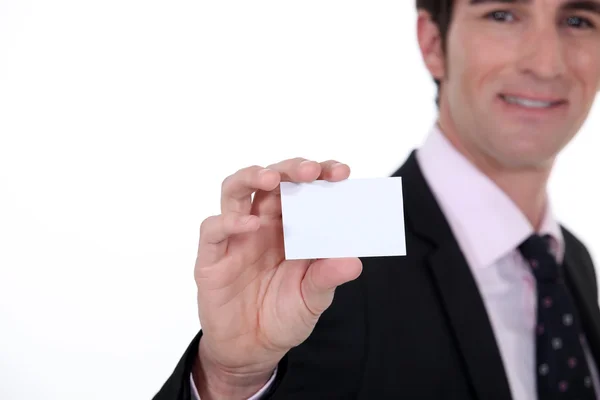 Man presenting business card — Stock Photo, Image