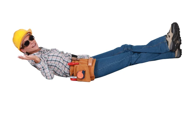 Female construction worker taking it easy — Stock Photo, Image