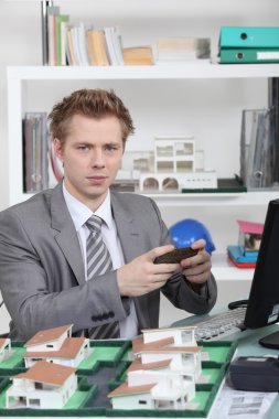 An architect working in his office clipart