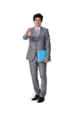 Portrait of a businessman giving the thumb's up clipart