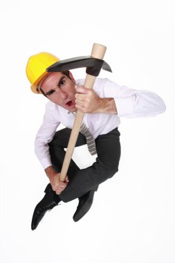 Engineer holding a pickax clipart