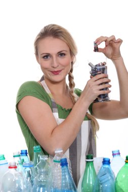 Woman sorting the recycling clipart