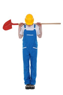 Earthwork worker looking down clipart