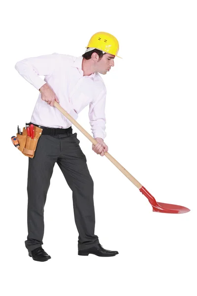 Man with helmet and shovel — Stock Photo, Image