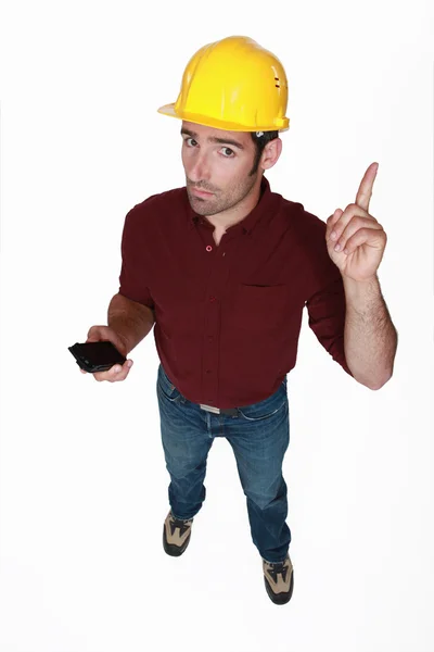 Man with a hardhat with bad news. — Stock Photo, Image