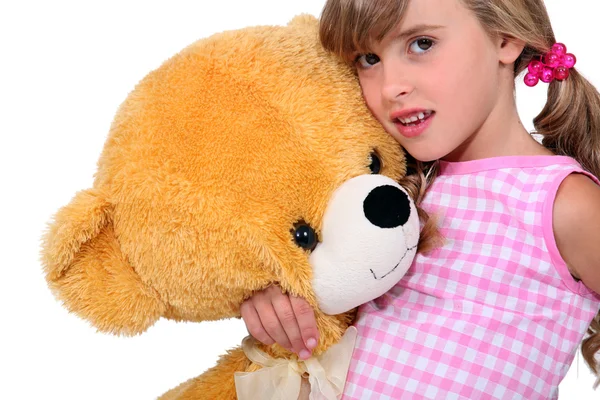 Menina com um urso de pelúcia — Fotografia de Stock