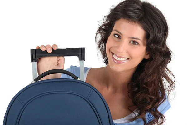Giovane donna con una valigia — Foto Stock