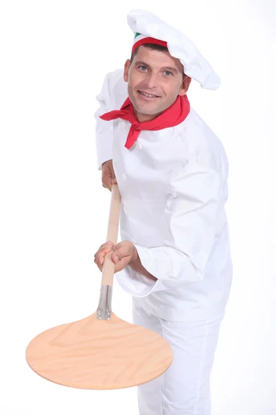 Pizzaiolo holding a peel — Stock Photo, Image
