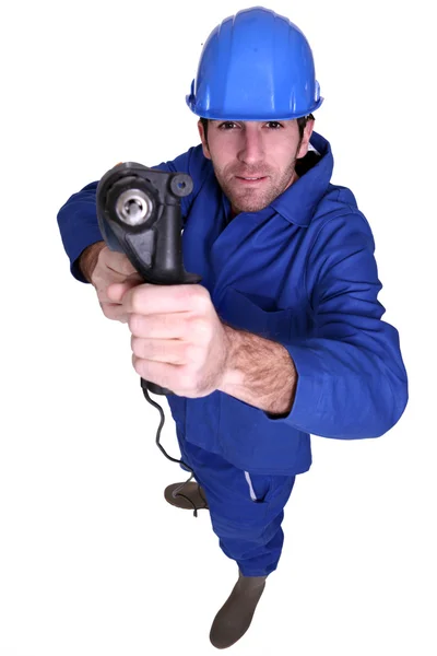 High angle shot blue collar using drill — Stock Photo, Image