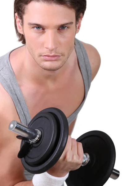 stock image A determined young man working out