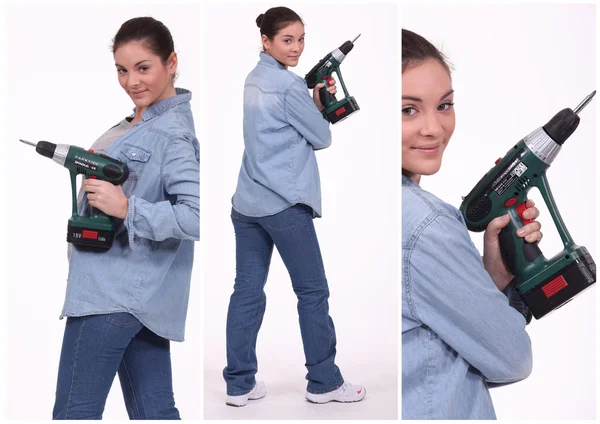 Woman operating a screwdriver — Stock Photo, Image