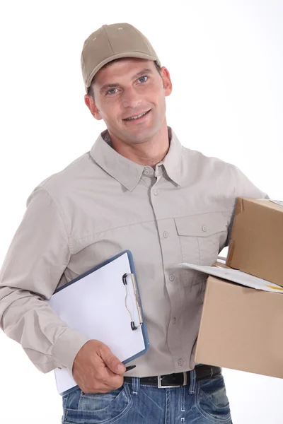 Deliveryman su sfondo bianco — Foto Stock