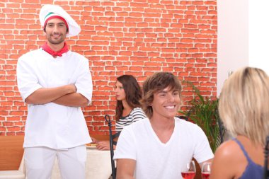 Couple having meal at a restuarant clipart