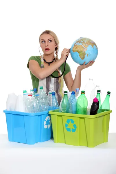 Portrait of a woman with plastic bottles — Stock Photo, Image