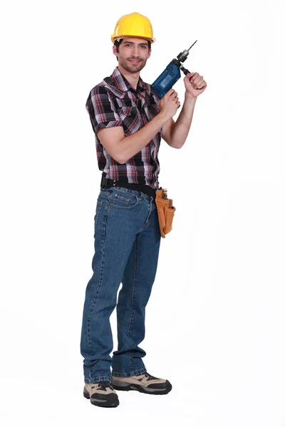 Carpinteiro posando com broca sem fio — Fotografia de Stock