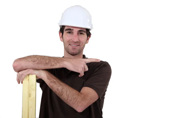 Carpenter pointing to empty copyspace — Stock Photo, Image