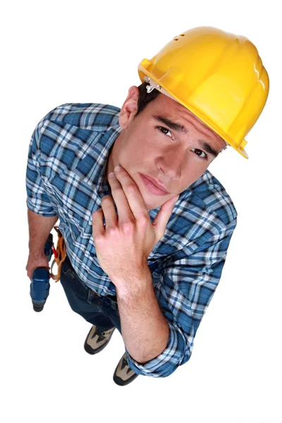 Pensive handyman — Stock Photo, Image