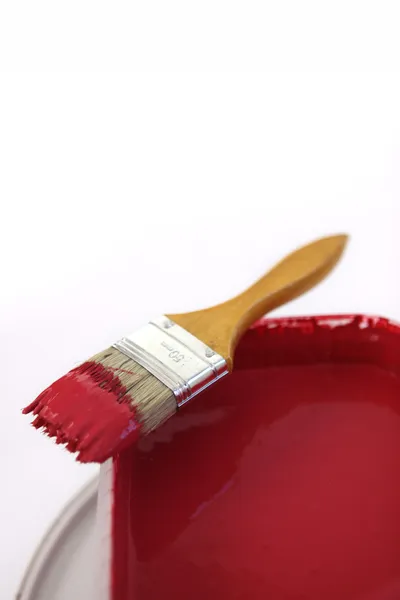 Paint pot och borste — Stockfoto