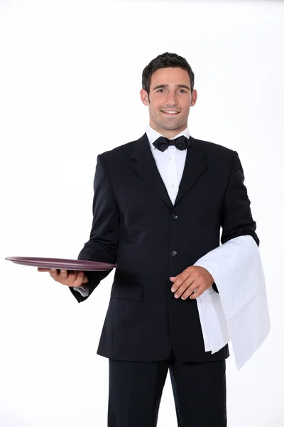 Καλά ντυμένος σερβιτόρος μπροστά στην κάμερα — Φωτογραφία Αρχείου