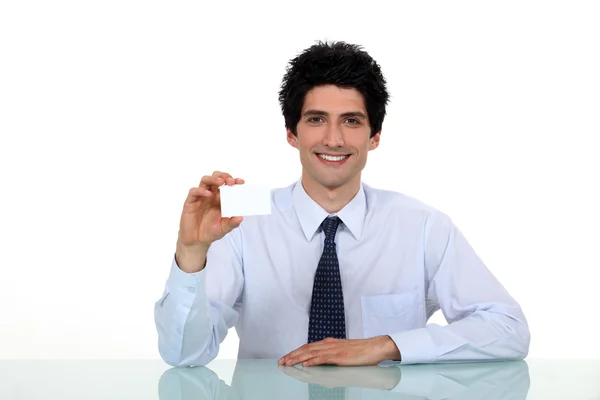Businessman showing business card — Stock Photo, Image