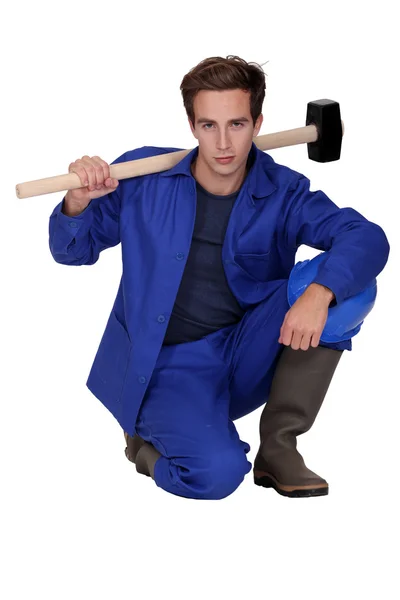 Worker with a sledgehammer — Stock Photo, Image