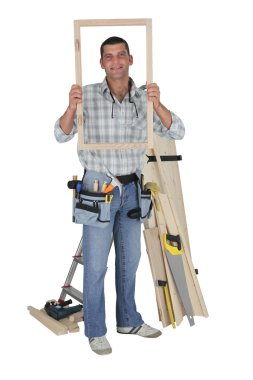 Craftsman holding a window frame clipart