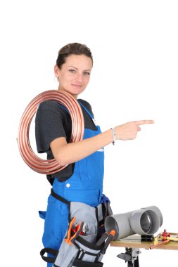 Female plumber with equipment clipart