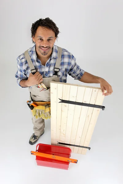 Carpenter proud of the work he has done — Stock Photo, Image