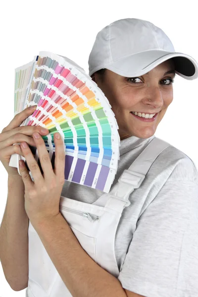 Pintor con una paleta de colores para elegir — Foto de Stock