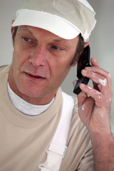 Painter making a call — Stock Photo, Image