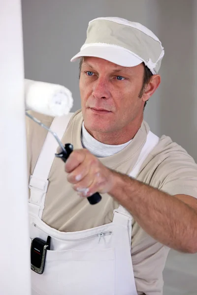Painter with a roller — Stock Photo, Image